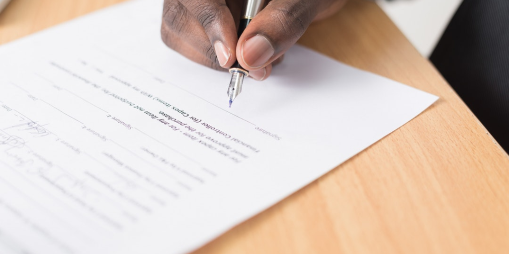 Document Process Outsourcing Case Study - shown by person sorting through papers