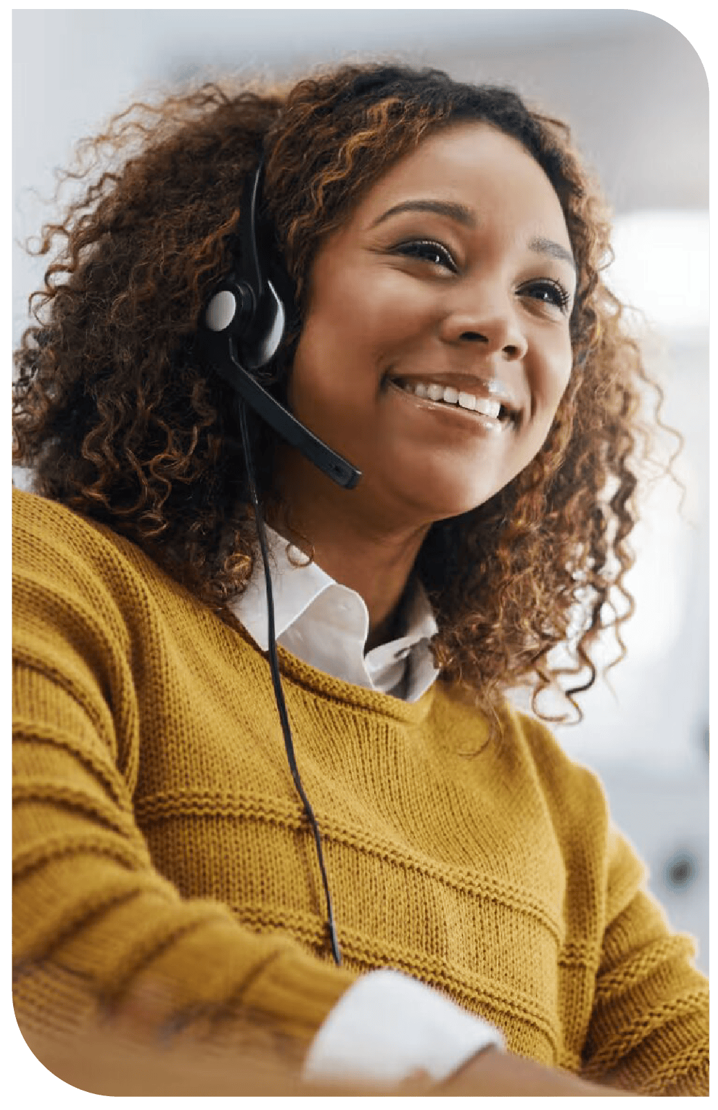 Smiling customer service female representative with a headset on.